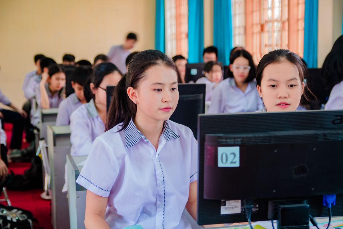 Illustrative photograph of students using computers